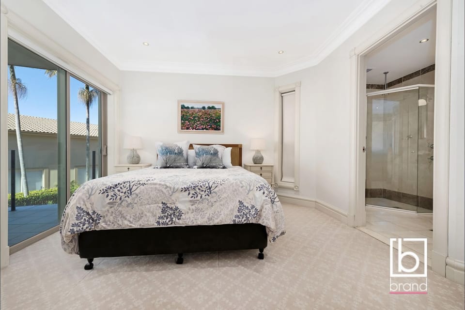 2nd bedroom - ensuite with private small balcony queen bed