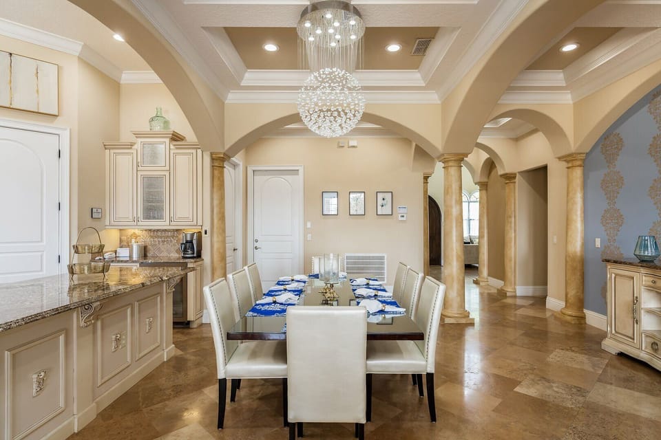 Host a family-style dinner at the formal dining table with seating for up to 8