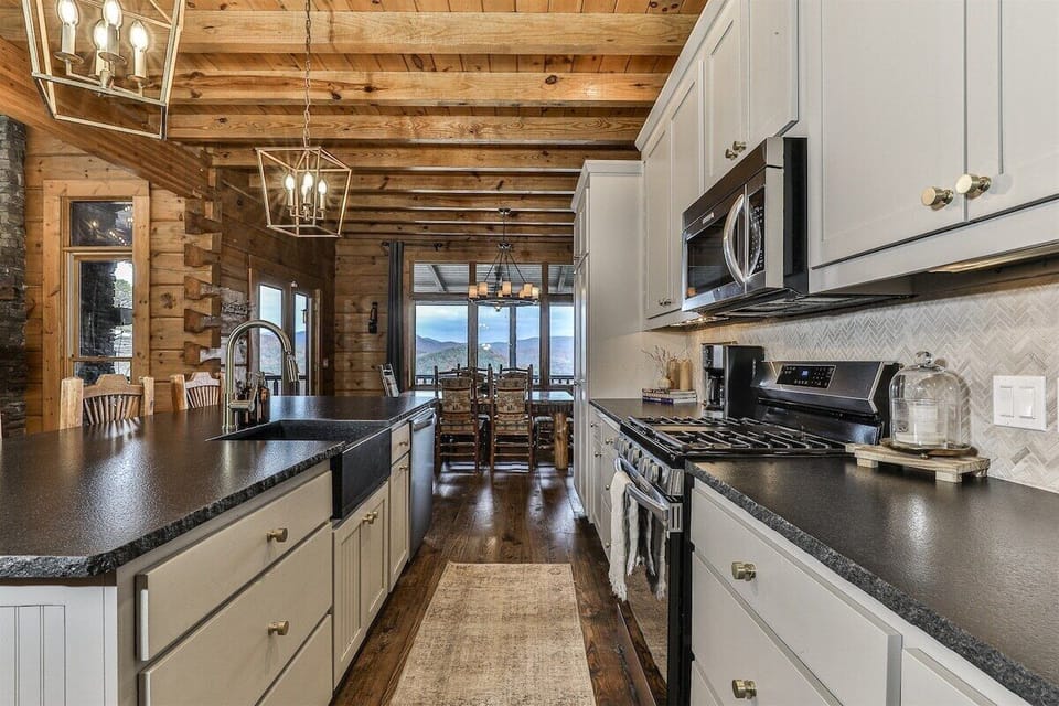 Kitchen and dining area offer excellent views