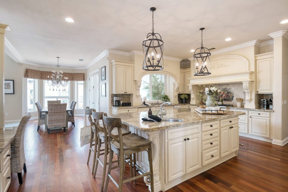 Barstool seating at the kitchen island.