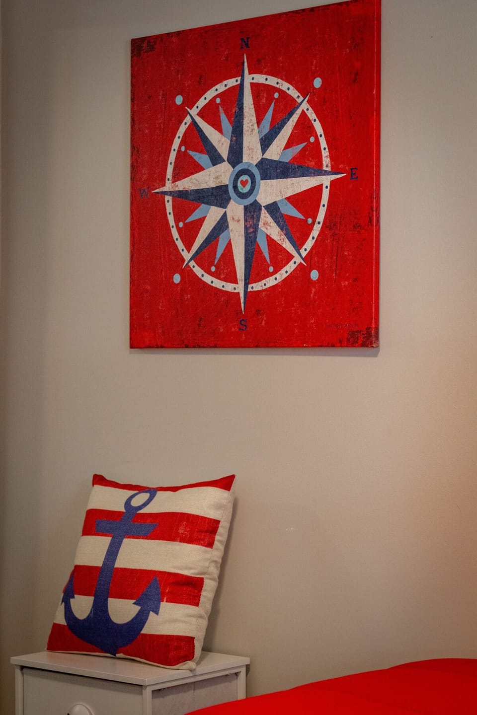 Nautical decor details with bold compass art and anchor accents