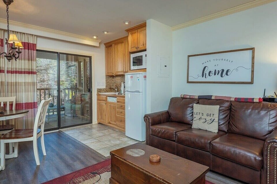Kitchen next to sliding glass doors for a beautiful early morning view!