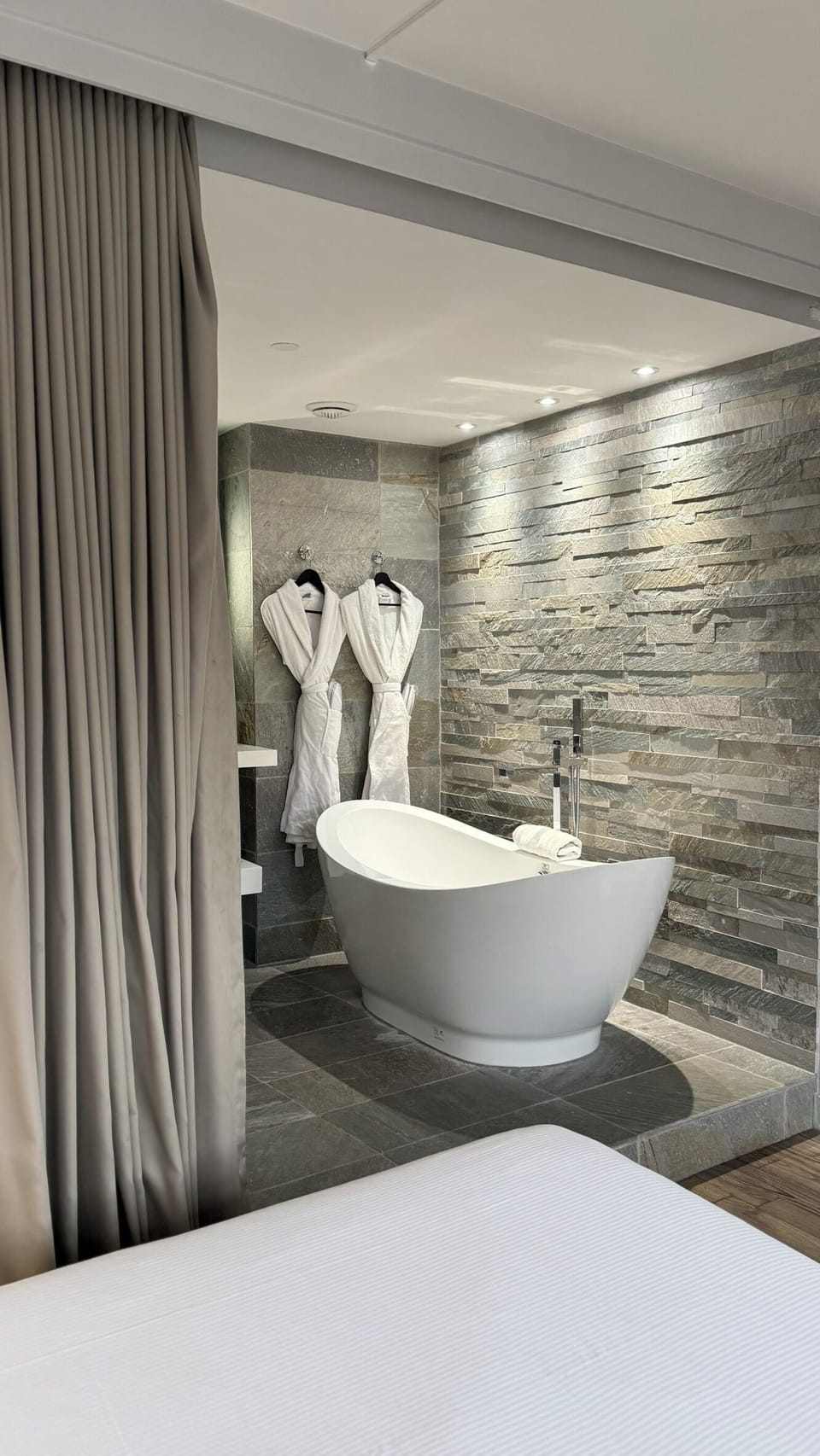 Suite | Bathroom | Hair dryer, towels