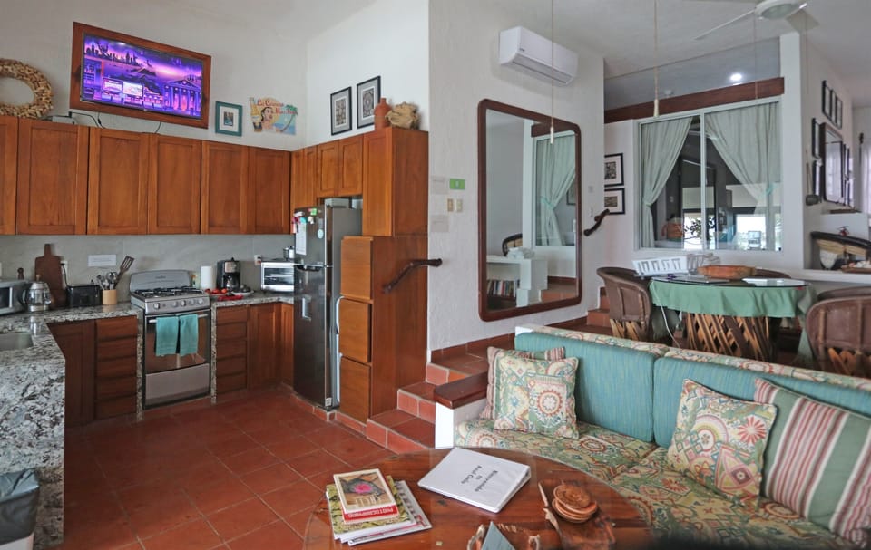 Looking from the Living Area to the Kitchen and Dining You can see the Multi-Level Floor Plan