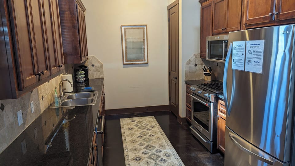 Kitchen  - Kitchen Aid Dish Washer, range and microwave.  LG refrigerator