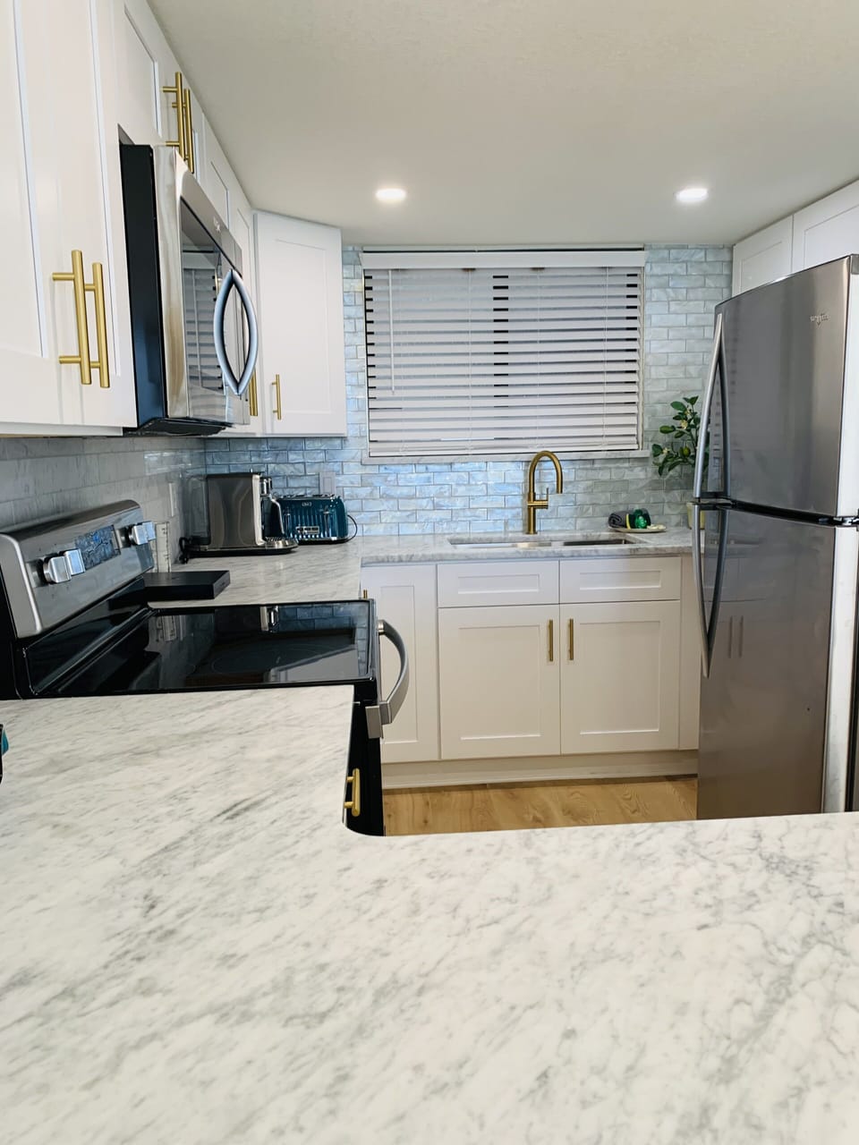 exquisite Italian marble countertops. 