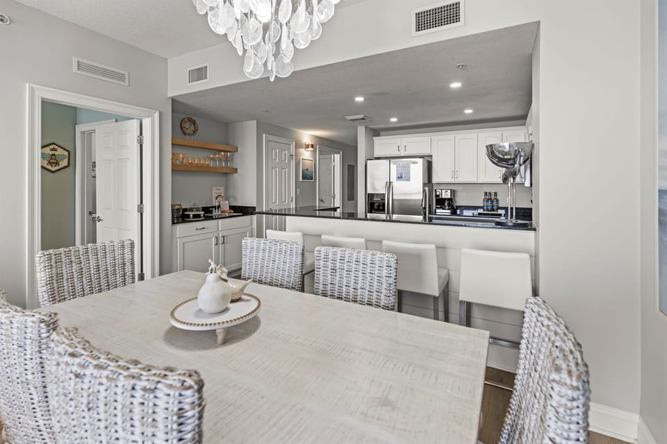 Gather around your elegant dining table while the chef prepares meals in your fully equipped kitchen, complete with modern appliances and stylish finishes.