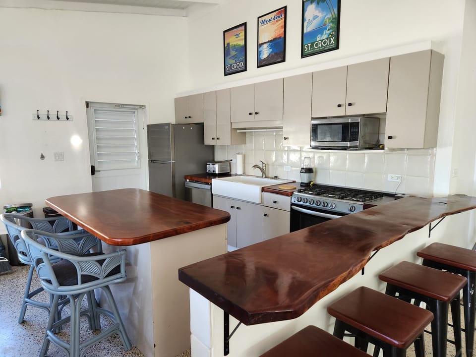 Our remodeled kitchen with mahogany counter tops and farmhouse sink.
