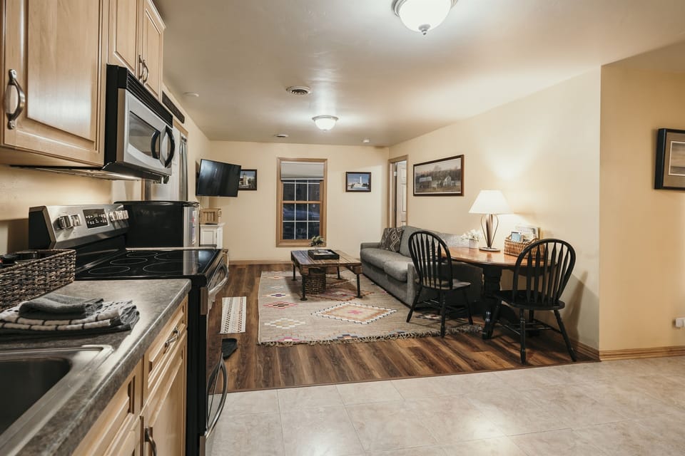 Cozy living room with Roku Smart TV, fast WiFi, and open layout — perfect for relaxing after hiking or biking Peninsula State Park
