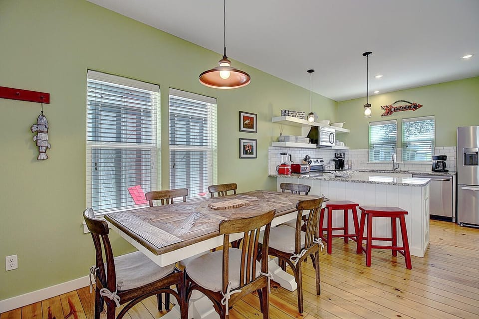 Your open-concept kitchen flows seamlessly into the dining area, perfect for morning coffee or family meals together.