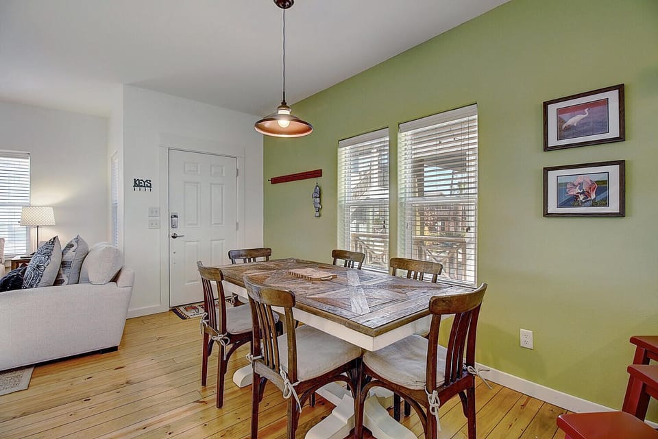 Gather around this beautiful dining table where shared meals and conversations create lasting memories during your stay.
