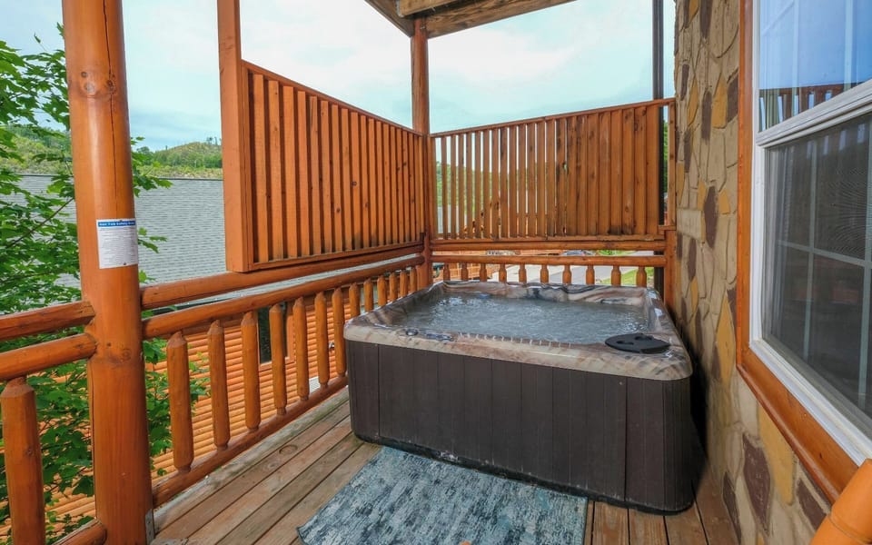 Steamy Outdoor Hot Tub with Privacy Fence