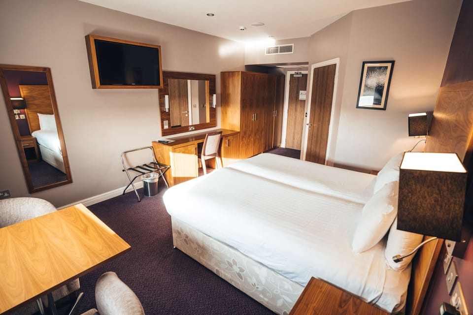 Standard Room | Desk, iron/ironing board, cribs (free), alarm clocks