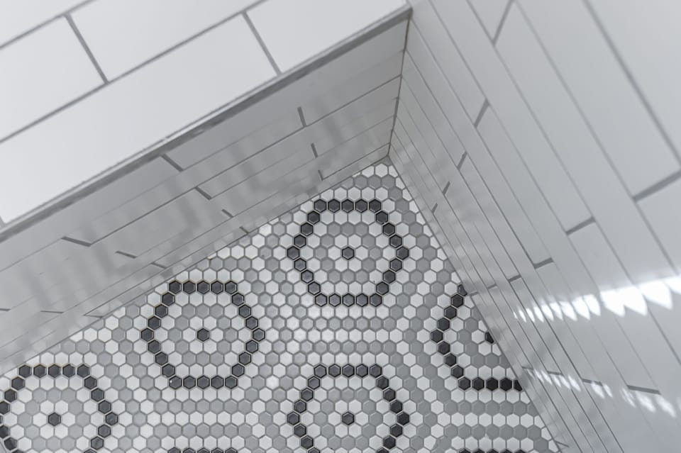 Newly tiled master bathroom