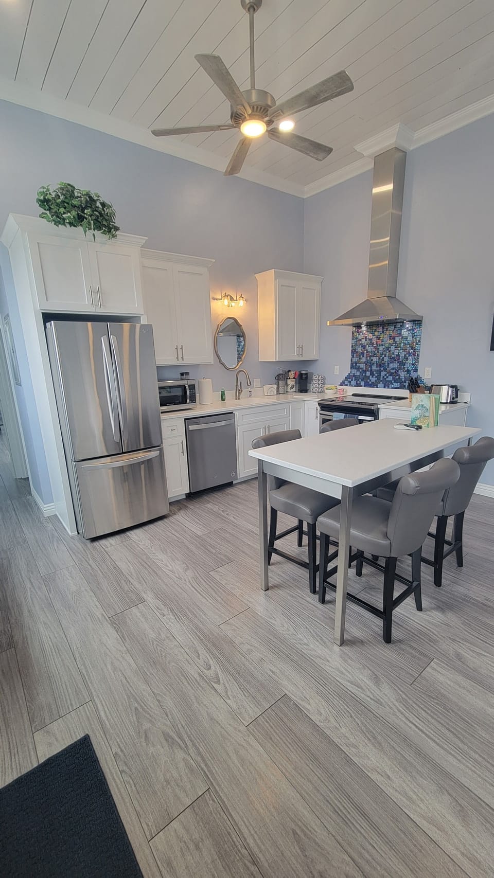Kitchen with new full size stainless steel appliances Coffee, teas or hot cocoa 