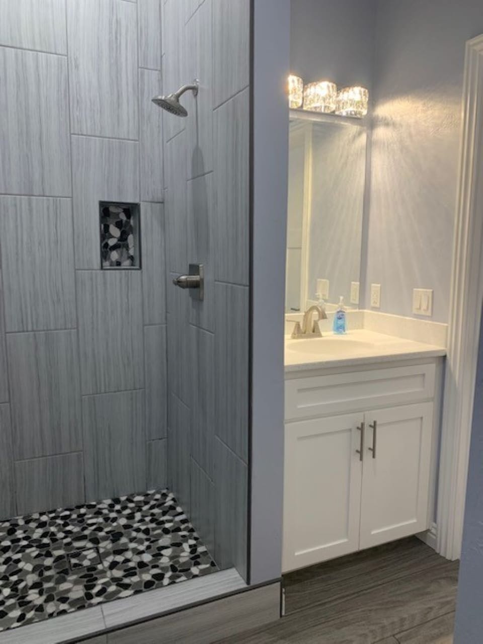 Bathroom-large shower, vanity, corian countertops stocked-shampoo conditioner 