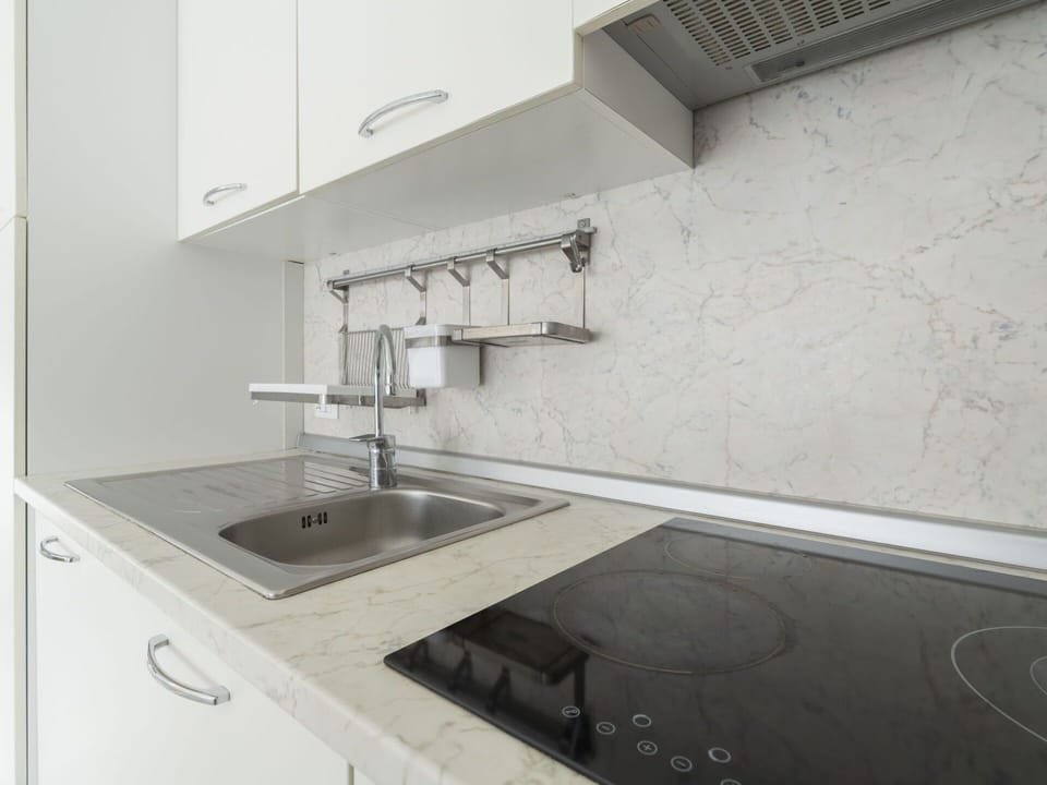 Tap, Kitchen Sink, Cabinetry, Building, Sink, Plumbing Fixture, Countertop, Kitchen, Lighting, Architecture