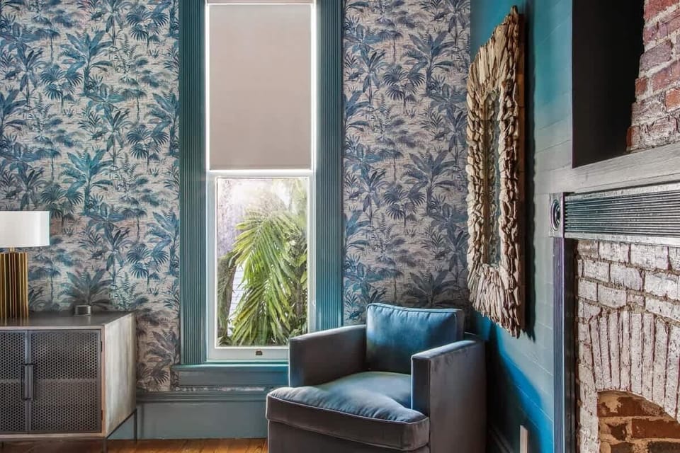 Lush Greenery Fills the Large Bedroom Windows