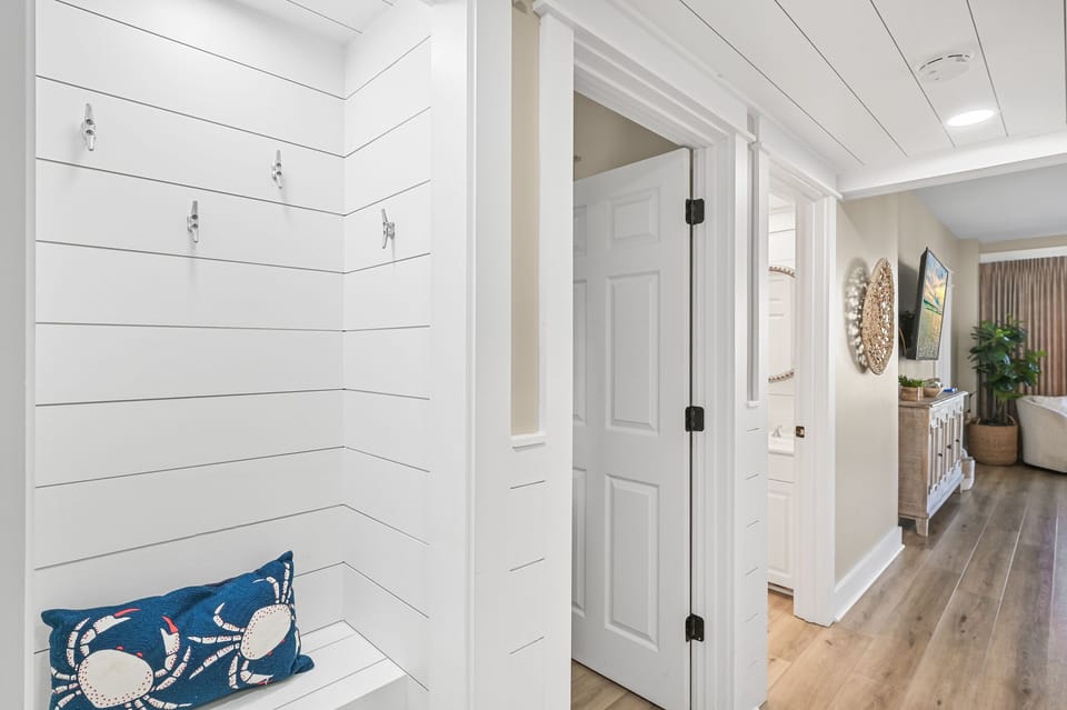 We created a cute nook for all your beach bags and towels