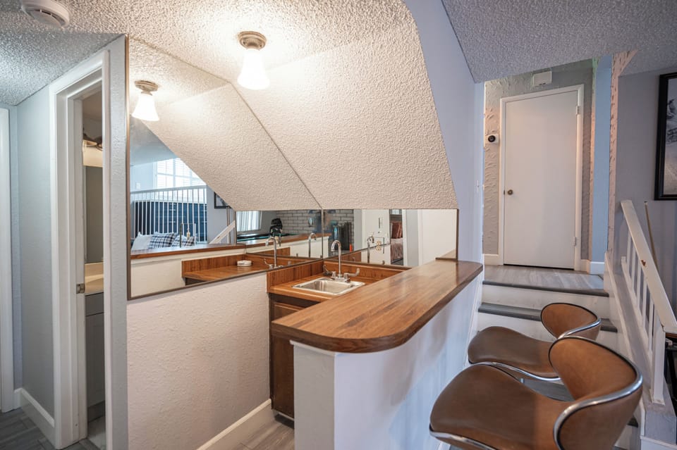 This is the wetbar in the game room, with a bathroom next to bedroom 4