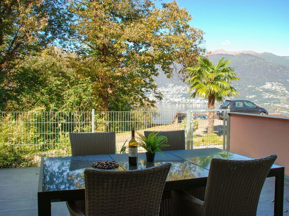 Sky, Plant, Property, Table, Furniture, Building, Nature, Shade, Chair, Outdoor Furniture