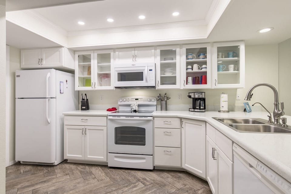Fully stocked Kitchen Area provides your pots, pans, utensils, and dish ware essential to prepare home cooked meals!