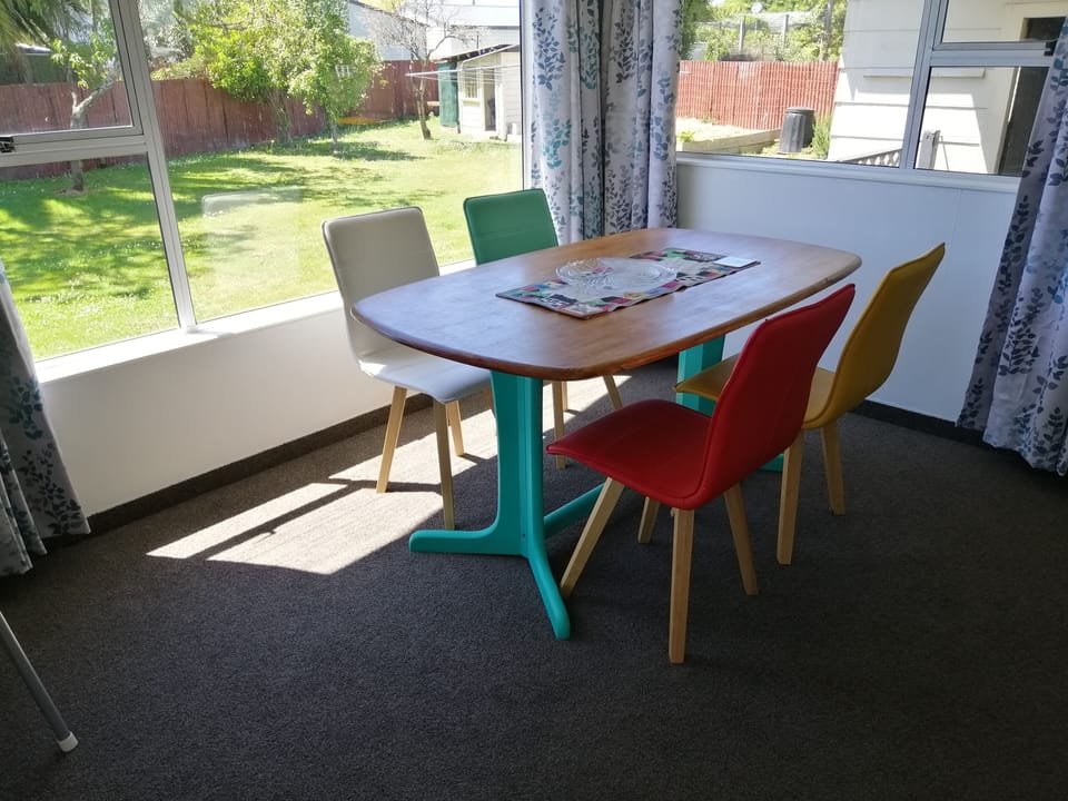 Dining room overlooking the spacious yard to the east