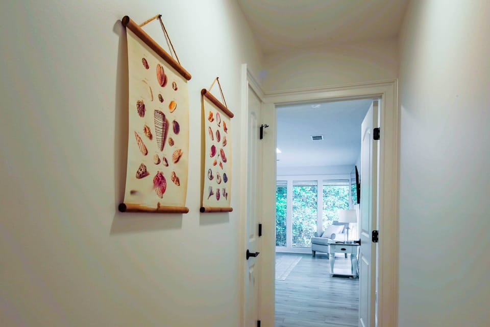 The master suite is just down this hallway from the living room.