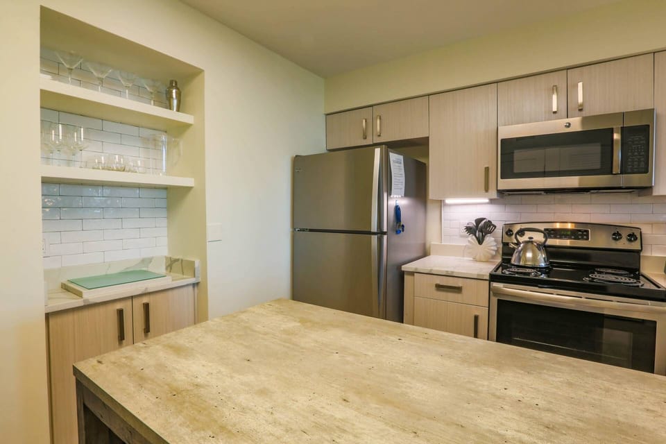 There's a spacious center island table to prepare your meals.
