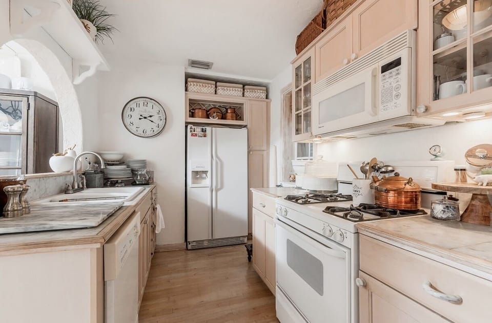 Gas range and refrig with ice and water dispenser