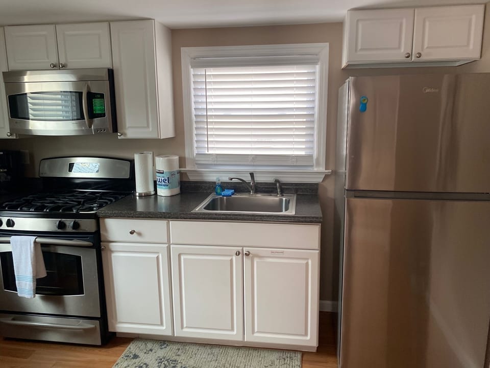 Fully stocked kitchen, stainless appliances