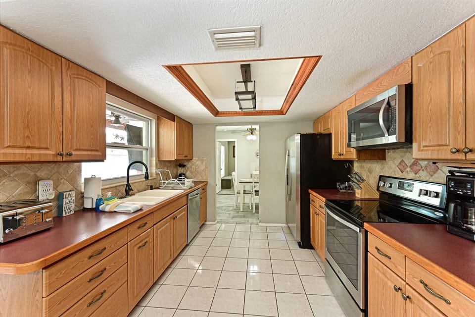 Fully Stocked Kitchen with Coffee Station & Stainless-Steel Appliances