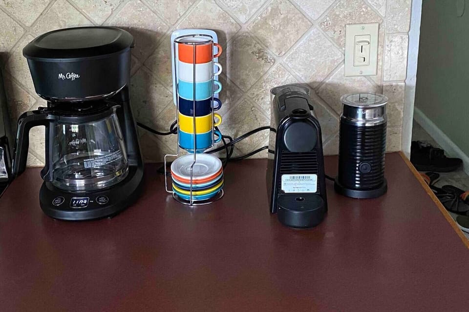 Enjoy the Complimentary Coffee Bar with a Nespresso Machine!