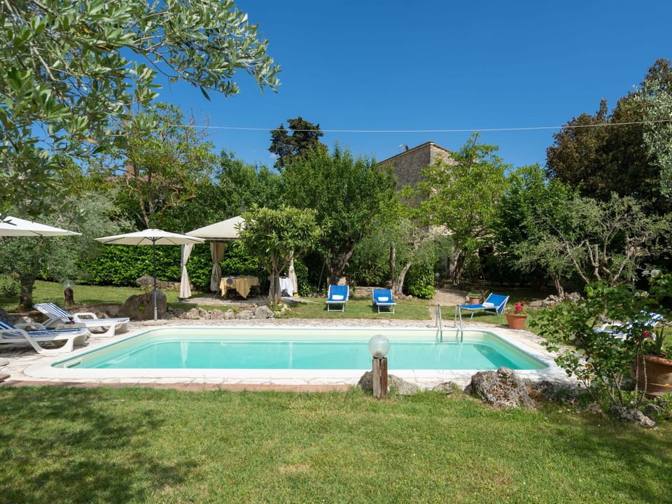 Water, Plant, Sky, Property, Swimming Pool, Tree, Building, Shade, Land Lot, Grass