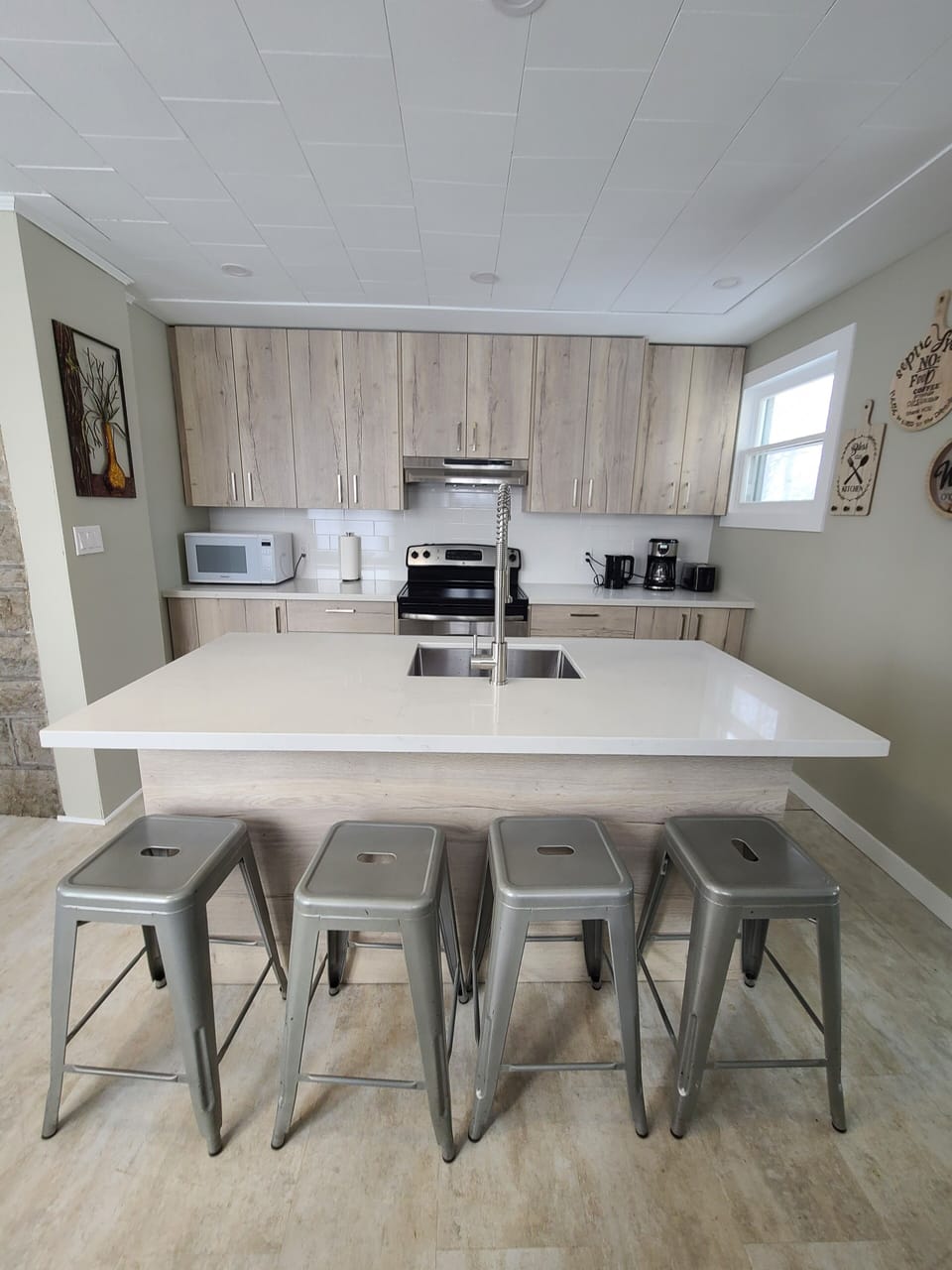 Kitchen with eat in/bar area.