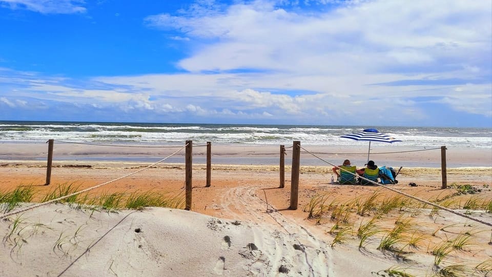 Come spend time at our beautiful beach.  We're just 600 steps away