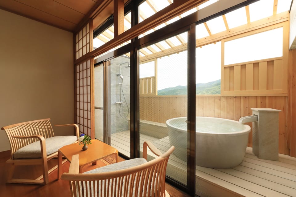 Deluxe Room with Semi-Open-Air Bath, Non Smoking | Free WiFi, bed sheets