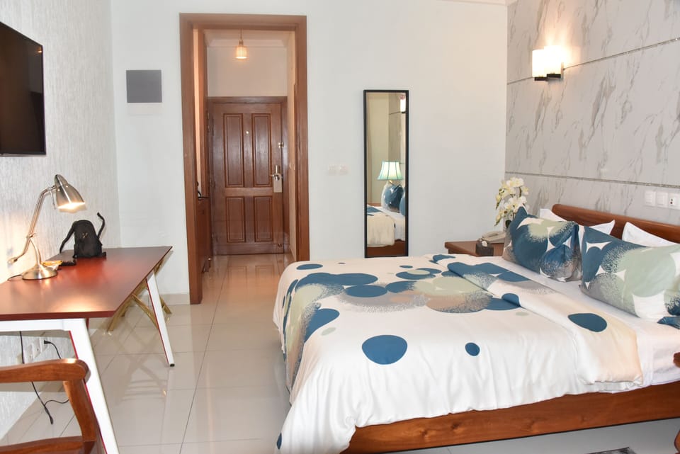 Luxury Room | Desk, laptop workspace, blackout drapes, free WiFi