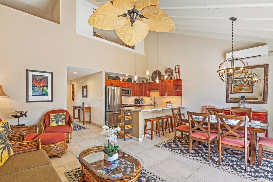 Comfortable seating and tropical decor make this space perfect for unwinding.