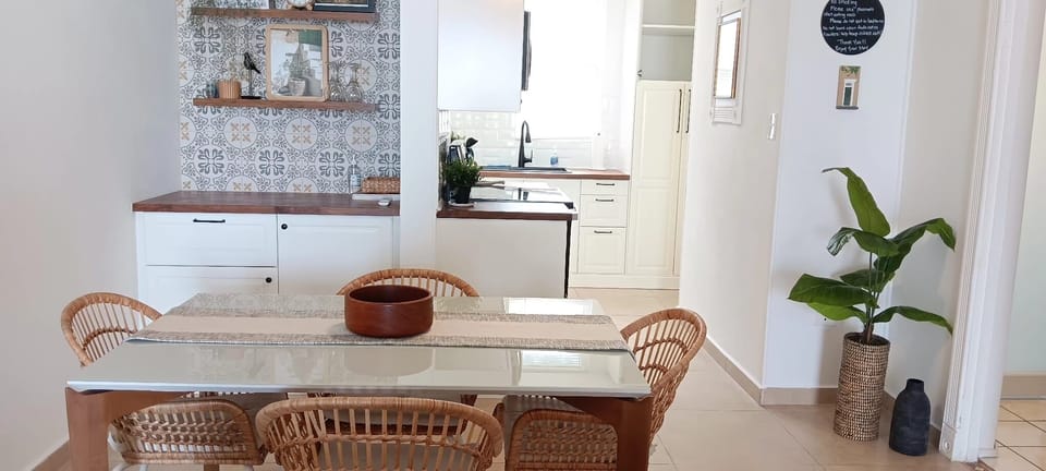 Newly remodeled dining area with AC and ceiling fan