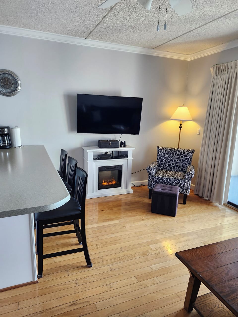 Cozy electric fireplace and 50" Samsung Smart TV for your enjoyment.
