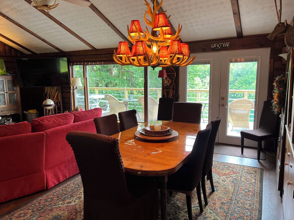 Gleaming knotty pine (safe from naughty spills). Endless inside lakeviews.