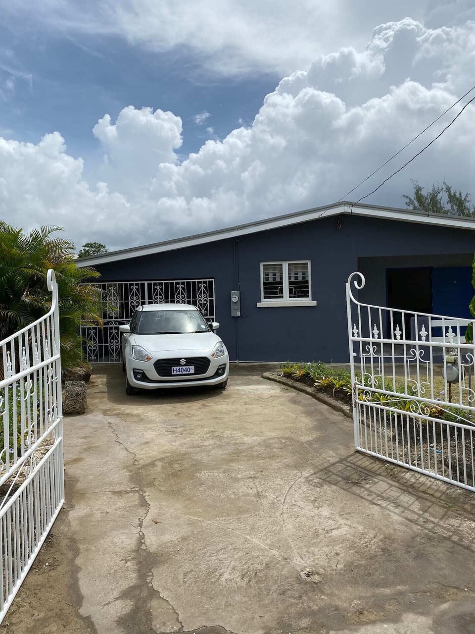 view from street with available rental car