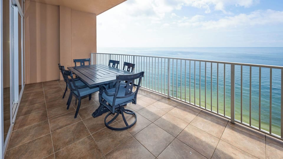 Dine al fresco at the spacious table while enjoying breathtaking views of the gulf waters stretching to the horizon
