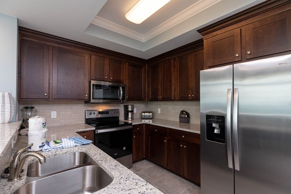 Craft delicious meals and share delightful moments in this inviting kitchen, complete with stainless appliances