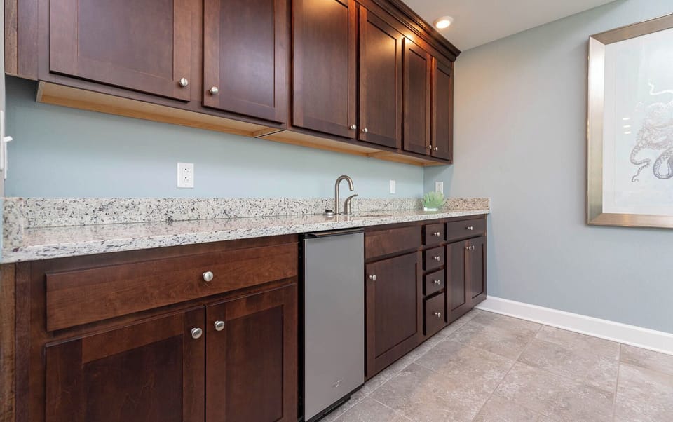 Mix drinks or store chilled beverages at the convenient wet bar, adding a refreshing touch to your getaway