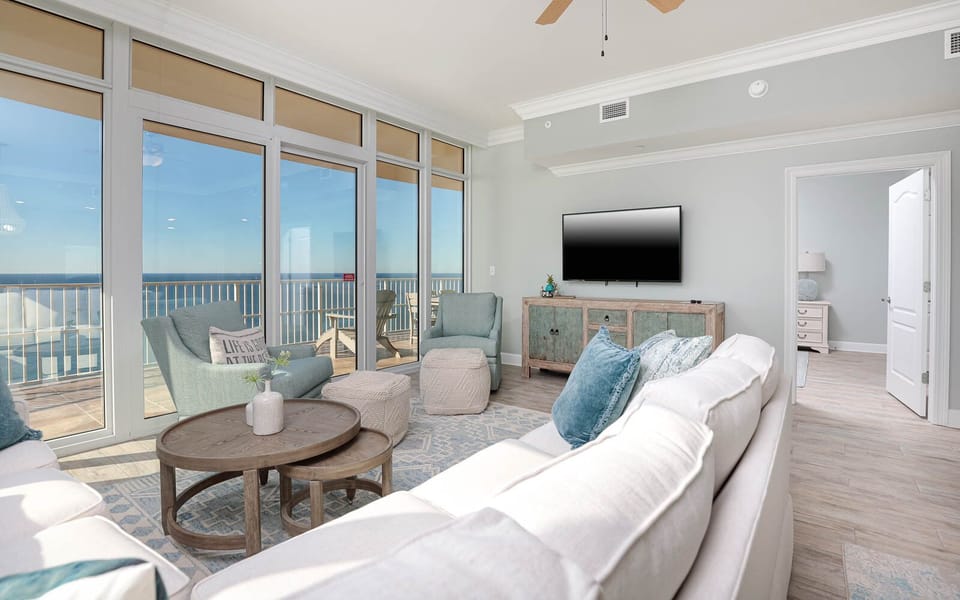 Unwind in the living area, featuring a queen sofa sleeper, soaking in the coastal views while streaming your favorite shows