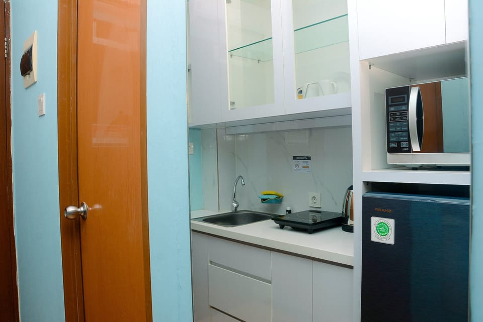 Apartment, Non Smoking, Kitchenette | Private kitchen | Fridge, microwave, stovetop, dishwasher