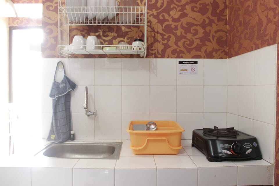 Apartment, Non Smoking, Kitchenette | Private kitchen | Fridge, stovetop, dishwasher, cookware/dishes/utensils