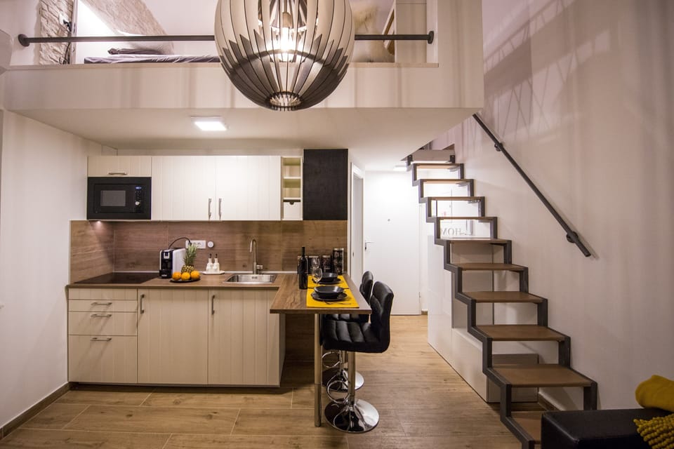 Studio (Studio Apartment with Hot Tub) | Private kitchen | Fridge